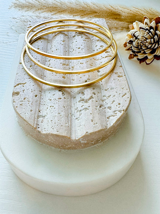 Skinny golden bangles