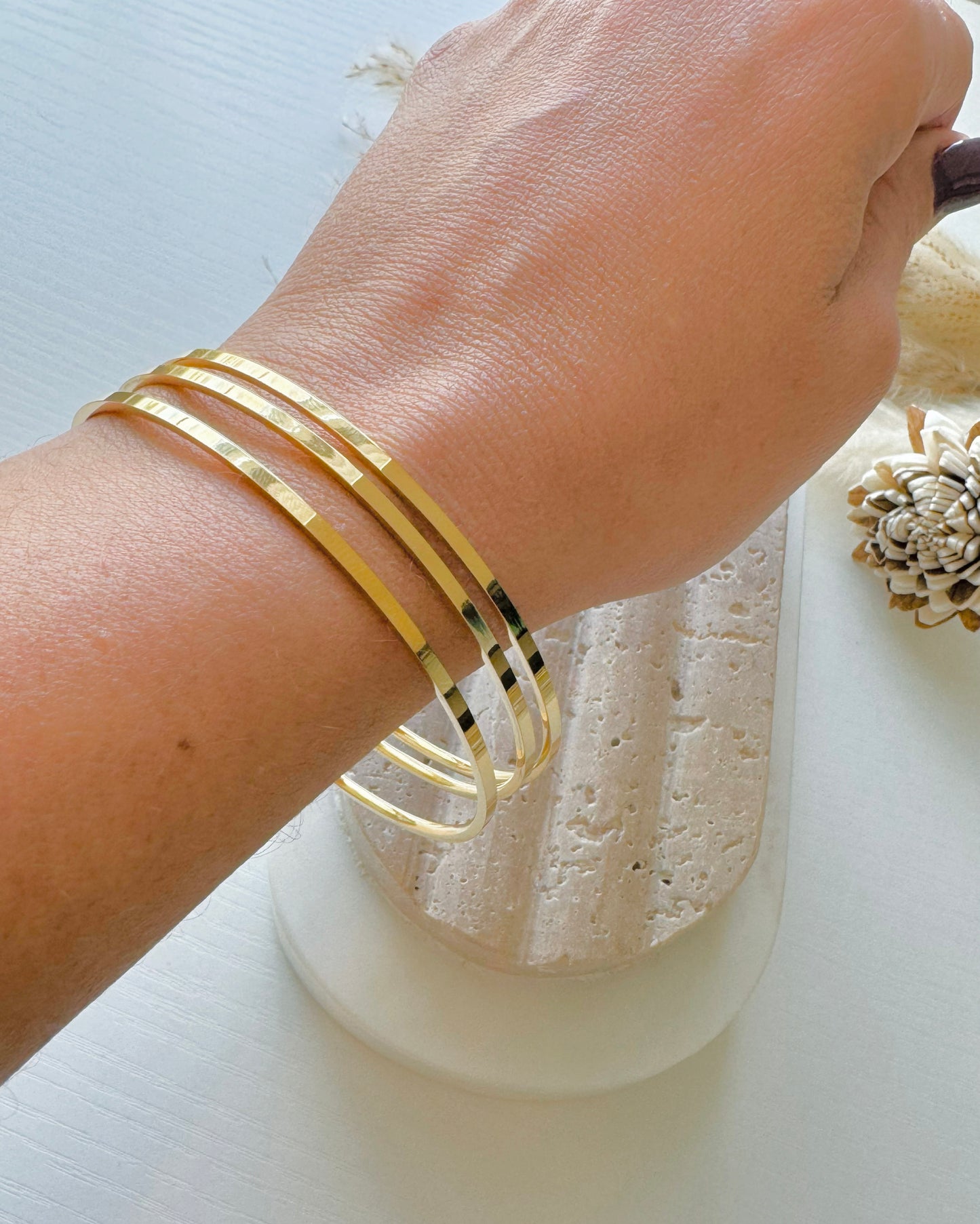 Skinny golden bangles